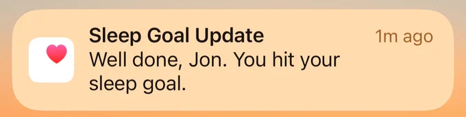 An iPhone notification that says I hit my sleep goal