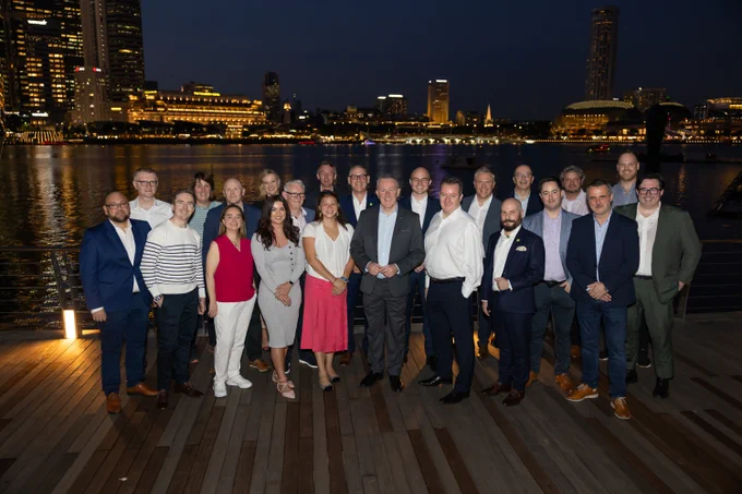 Pictured at Marina Bay in Singapore are representatives of the seven NI companies on the joint trade mission to Singapore with Economy Minister Conor Murphy and Invest NI staff.