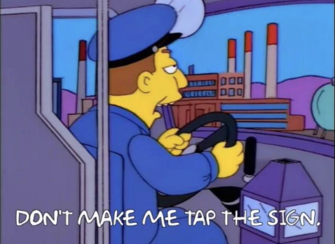 bus driver with the caption "don't make me tap the sign"