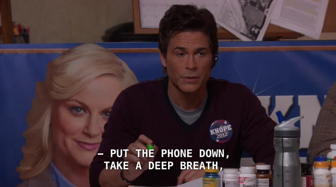 Chris Traeger saying "put the phone down, take a deep breath,"