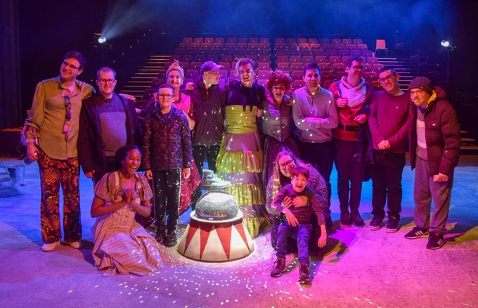 A community group pictured with the cast of Cinderella: A Fairytale