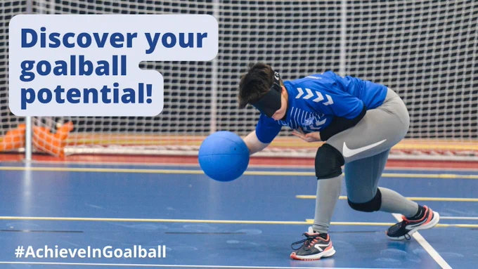 A female goalball player in a blue top draws the ball back to throw. She is wearing black eyeshades and knee pads. Text on the image reads 'Discover your goalball potential!'