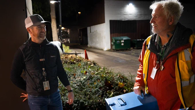 County Administrator Steve Mokrohisky greets driver teams as they return to the Lane County Elections Office with ballots retrieved from official drop boxes.