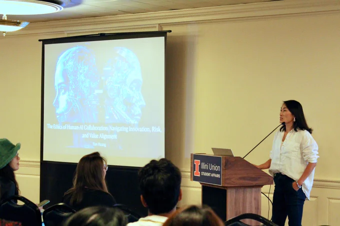 Associate Professor Yun Huang presenting 
