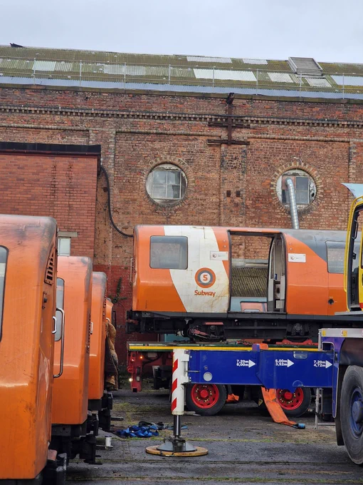 Various Glasgow Subway cars at the St. Rollox Railway Works 