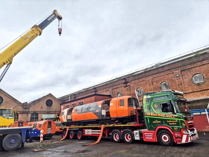 Glasgow Subway car being unloaded at the Caley Railway Works in Springburn 