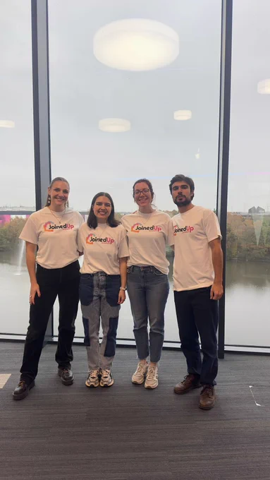 4 colleagues from UK Youth wearing Joined Up tshirts