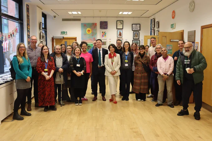 A group of people at the artwork display.
