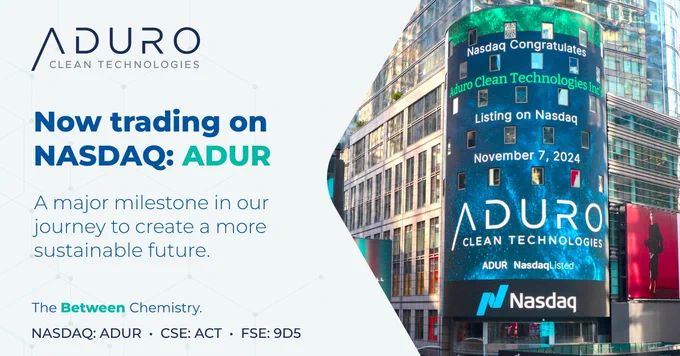 Aduro's Nasdaq announcement on the Times Square billboard. Text reads: Now trading on NASDAQ: ADUR. A major milestone in our journey to create a more sustainable future. The Between Chemistry. NASDAQ: ADUR, CSE:ACT, FSE:9D5