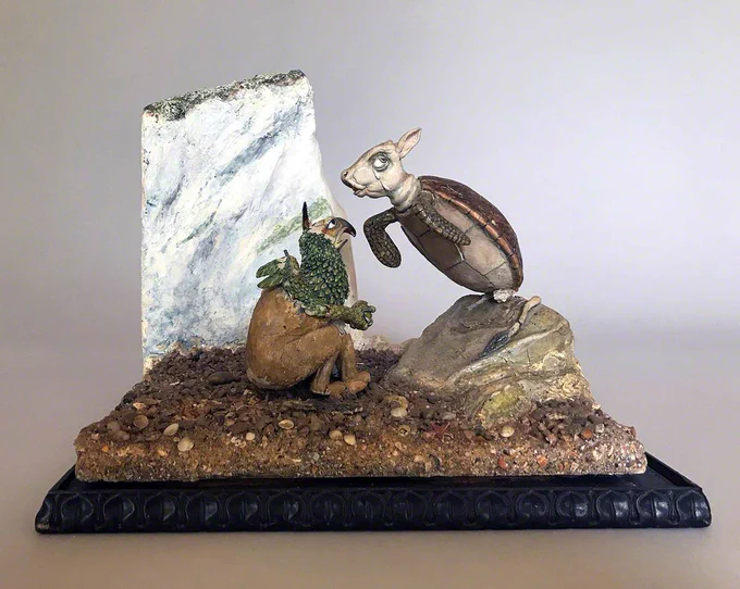 Wax, wood and paper sculpture depicting the Gryphon and Mock Turtle, inspired by John Tenniel's original illustrations for 'Through the Looking-Glass' by Lewis Carroll.