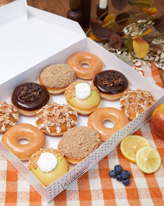 Krispy Kreme Doughnut Collection called Thanksgiving Pies featuring four doughnuts: Chocolate Silk Pie​, Lemon Creme Pie, Blueberry Crisp and Apple Crumble  