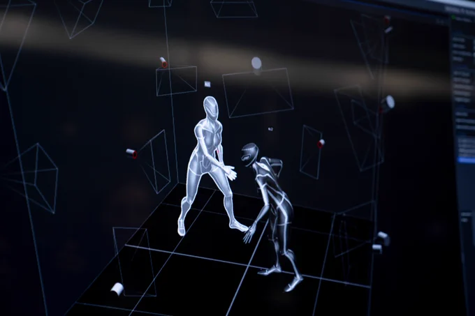 digital screen image of two computer generated people in a studio