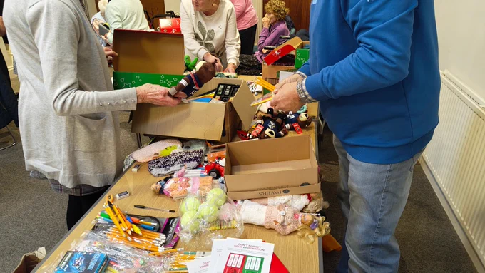 Packing shoe boxes for children 