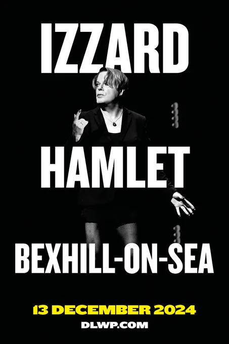 A person with a black background behind them, they are wearing black and fishnet tights. They appear to be performing. Layered on top is the text: 'IZZARD HAMLET. BEXHILL-ON-SEA. 13 DECEMBER. DLWP.COM'