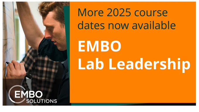 A man writing on a flip chart during an in-person lab leadership course. Text highlights that we have launched more course dates for 2025.