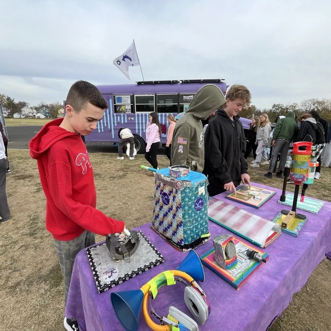 Students experiment during a visit from the Physics Bus