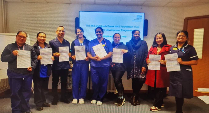 Nurses accepting their certificates for Preceptor training