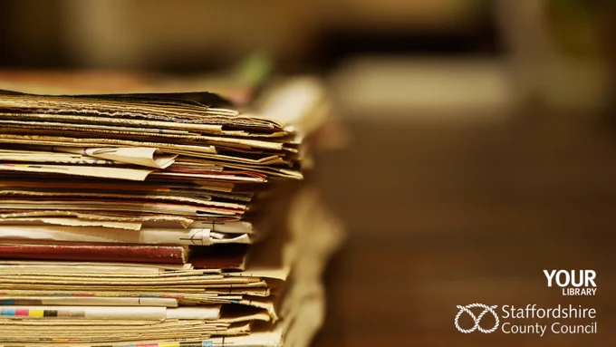 A pile of old papers and books