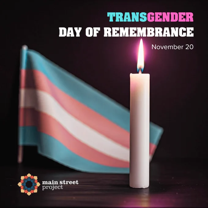 Image of a trans flag accompanied by a lit candle. The text reads "Transgender day of remembrance. November 20." There is a Main Street Project logo in the bottom left corner.
