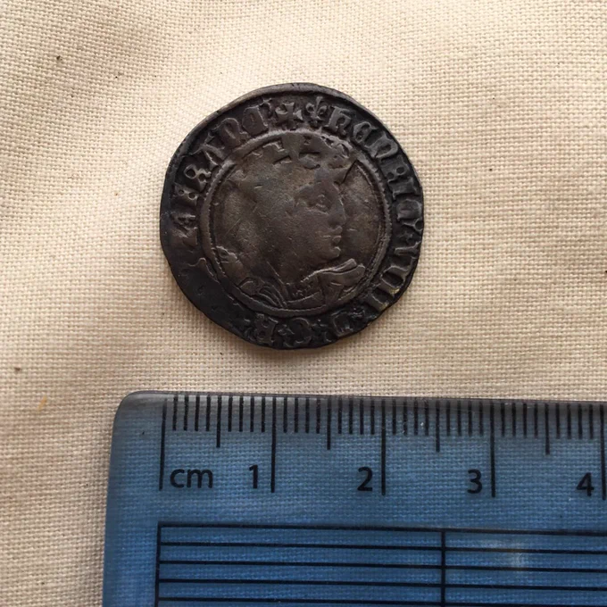 Obverse of a King Henry VIII groat with a ruler showing that it is approx. 23mm in diameter