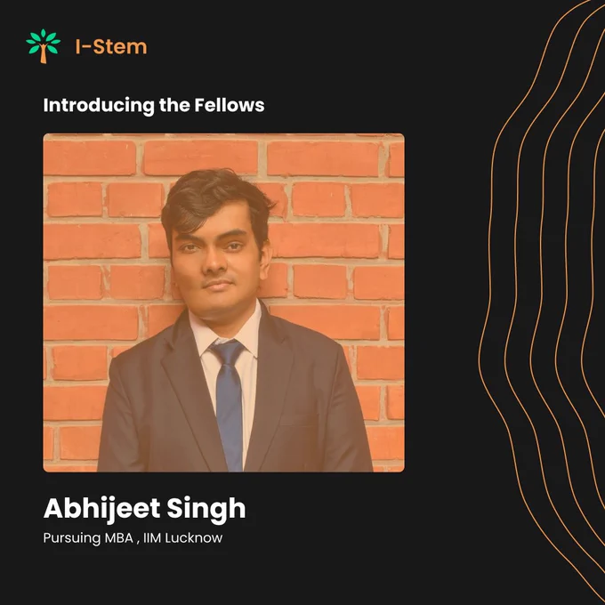 Portrait of Abhijeet Singh, an MBA student at IIM Lucknow, standing in front of a brick wall. Text reads 'Introducing the Fellows' and 'Abhijeet Singh' on a dark background