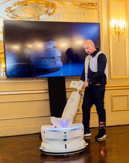 Image of Ryan McClymonds introducing the i-walk at a press event.