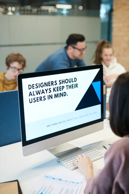 A computer screen with text that says “Designers should always keep their users in mind.”