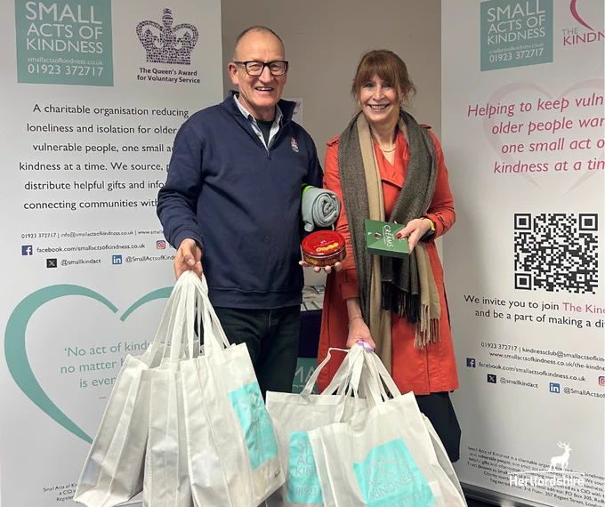 Richard Roberts and Angie Ridgwell holding Winter Warmer Bags
