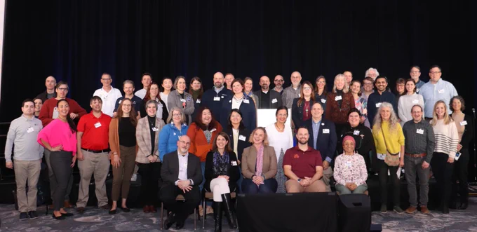 People in the NASA Citizen Science community gathered together for a group photo. 