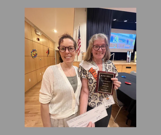 Tracey Cave and Barbara Ambros at the Award in Management ceremony on UNC's campus