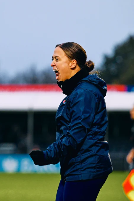 Amy Merricks celebrates at the full-time whistle.