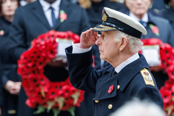 His Majesty The King salutes after laying a wreath at the Cenotaph during the National Service of Remembrance.