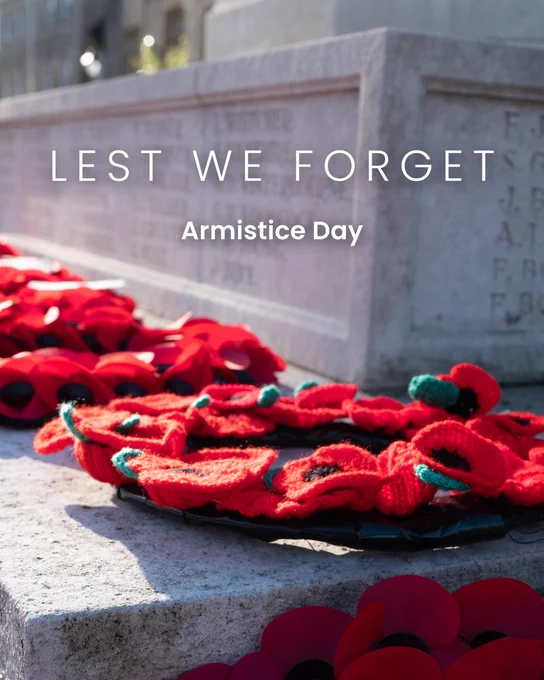 Image of a poppy wreath laid at a memorial.

Text: Lest we forget.

Armistice Day.