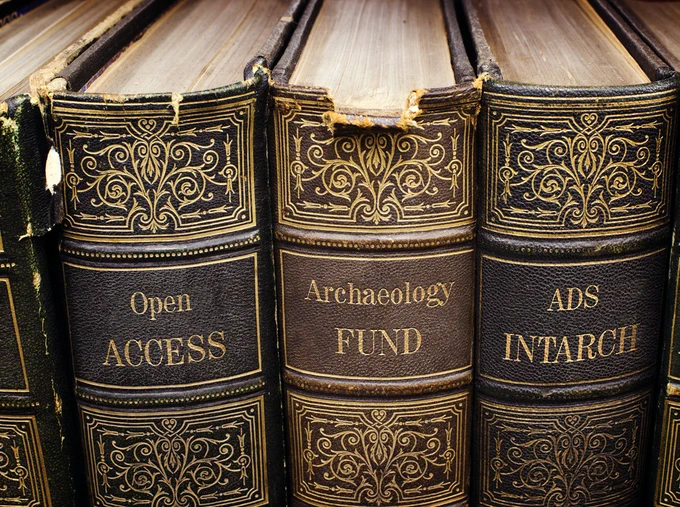 A picture of three old books that read 'Open Access Archaeology Fund, ADS, Intarch'