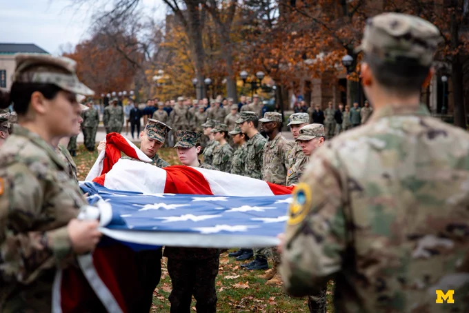 U-M ROTC members holding the flag on the Diag.