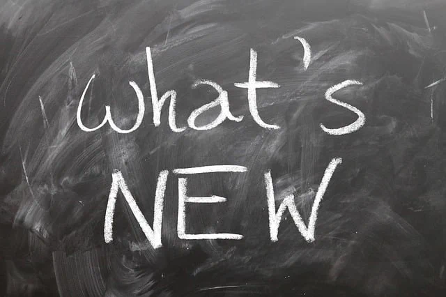 "what's NEW" written in chalk on a blackboard