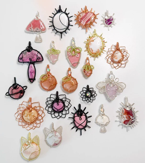 Rhodochrosite watermelon mushroom, selenite moon sun, rhodochrosite watermelon sun, faceted sapphire sun, cobaltoan calcite mushroom, morganite strawberry, thulite strawberry, scolecite & orange tourmaline beaded sun, scolecite sunflower, rhodonite saturn, peach moonstone peach twins, pink opal baby strawberry, opal & ethically sourced buffalo bone moon face sunflower, cobaltoan calcite heart sunflower, Ethiopian Opal sunflower, rainbow moonstone & kunzite dragonfly fairy, scolecite cat, pink tourmaline cat, thulite heart sun, opal & moon face mushroom, crazy lace agate sun
