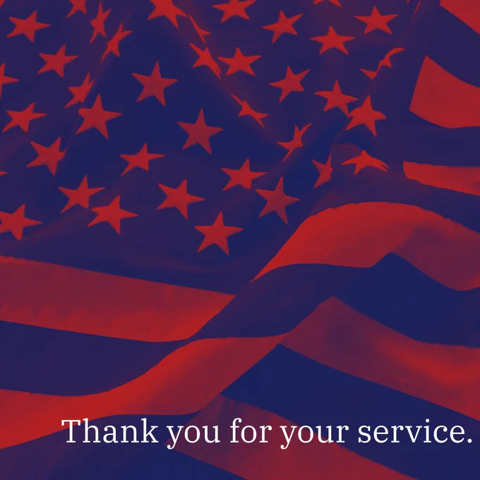 Close-up of a United States flag with a "Thank you for your service" message.