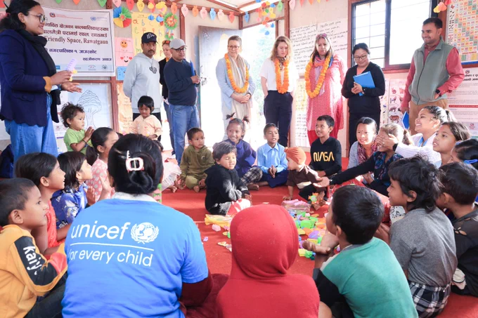 Interacting with children at the Child-Friendly Spaces. 