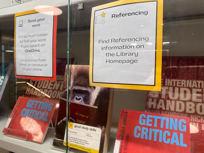 Image shows study skills book display and some info about referencing and saving your work online