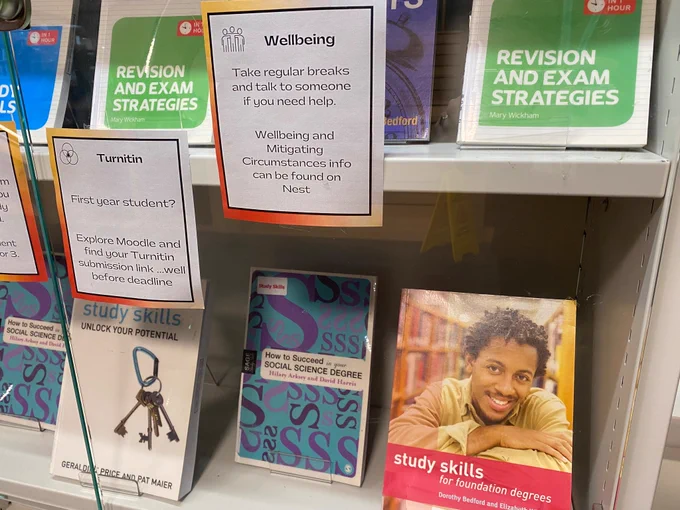 Image shows study skills books with messages about Turnitin and Wellbeing