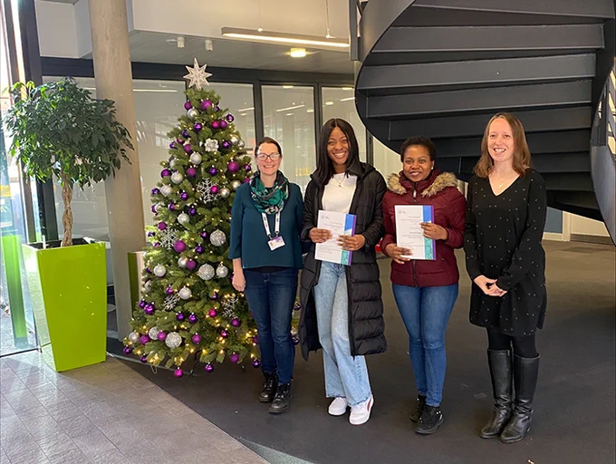 Louise Warwick-Booth and Susan Coan with 2 postgraduate research students