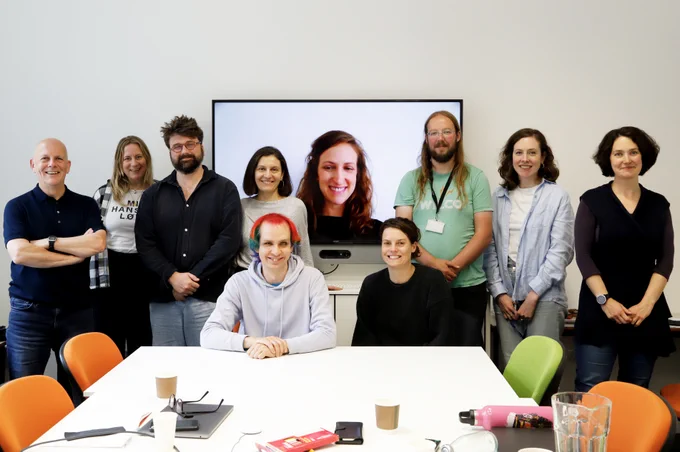 Group photo of smiling Writing Week participants.