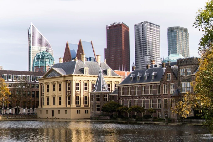 A picture of buildings in the Hague, Netherlands, taken across the canal.