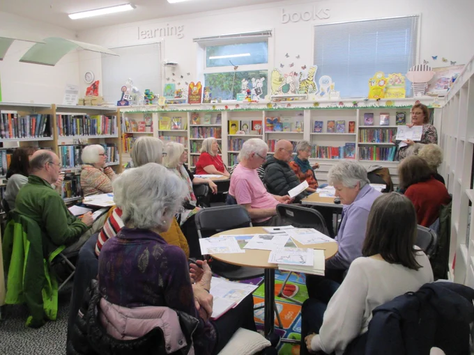 large group of people in library