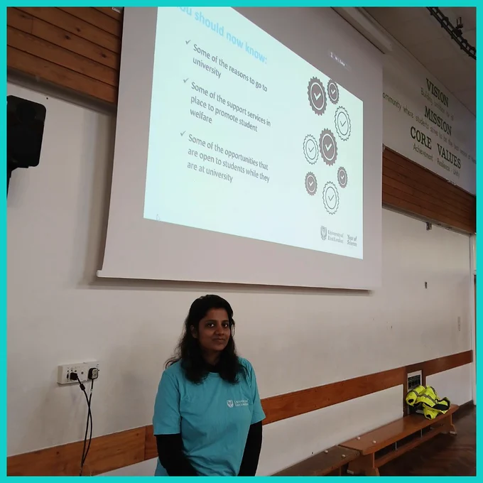 University student ambassador delivering a presentation about higher education