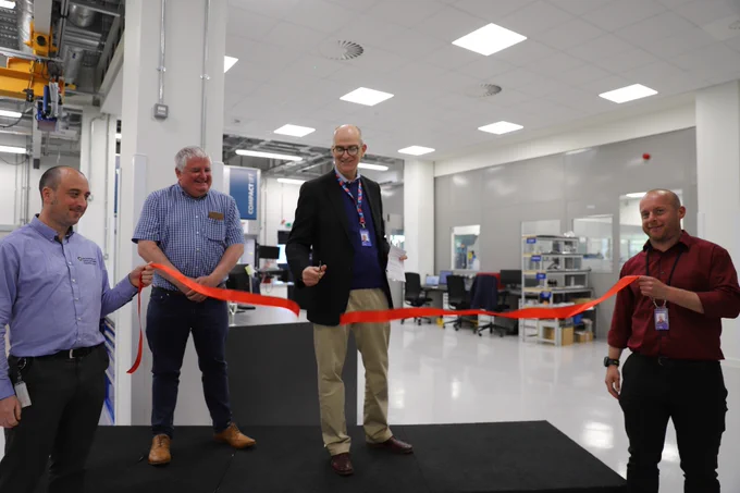 The moment the ribbon gets cut at ETC's Opening