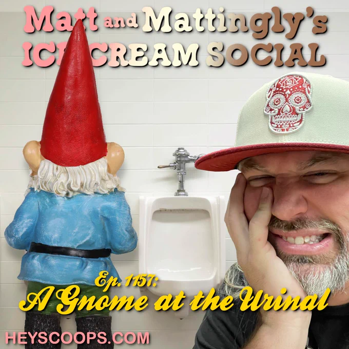 There's a gnome at the urinal! Jacob, in the foreground, grimaces. Nothing can kill that grimace.