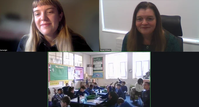 A screenshot of a Zoom discussion showing Sioned Williams MS and a class of primary school age children 