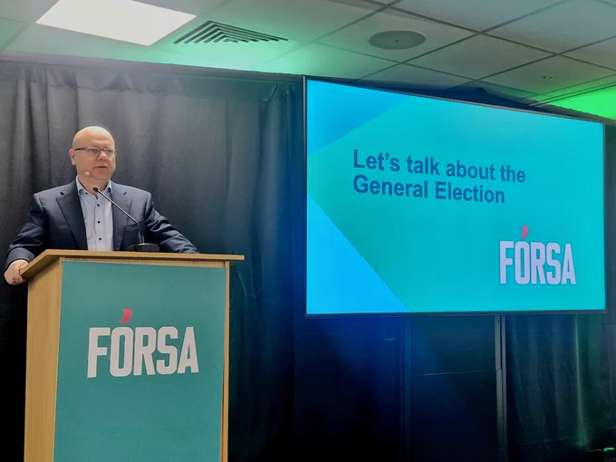 Kevin Callinan, General Secretary, at the podium.